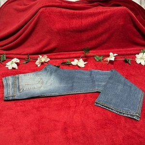 A blue 20 year vintage stretch out jeans in a good condition.